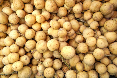 Full frame shot of onions for sale at market stall