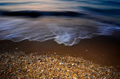 High angle view of surf on beach