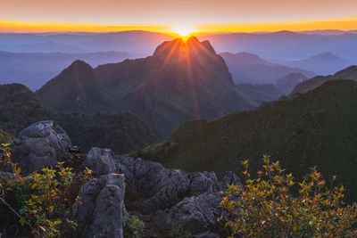 Scenic view of mountains against sky during sunset