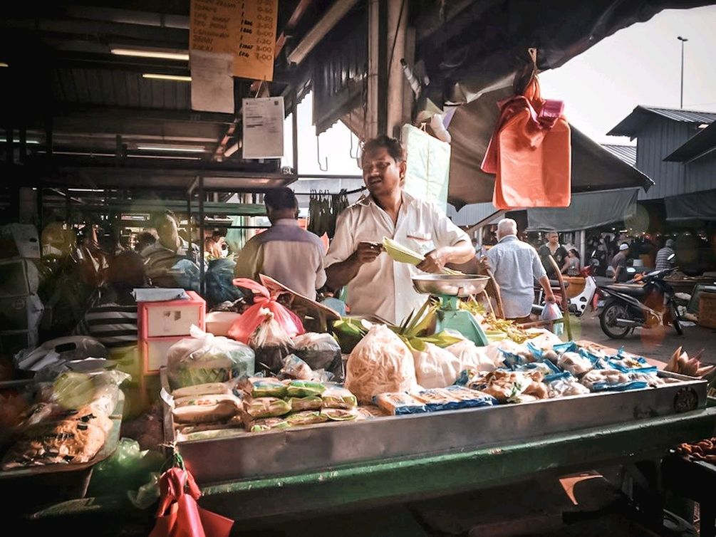 market, retail, food, food and drink, business, market stall, real people, freshness, occupation, men, choice, small business, healthy eating, people, variation, for sale, selling, retail display, vegetable, working, buying, sale, outdoors