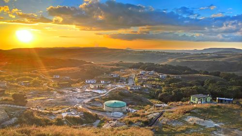 High angle view of landscape against sky during sunset