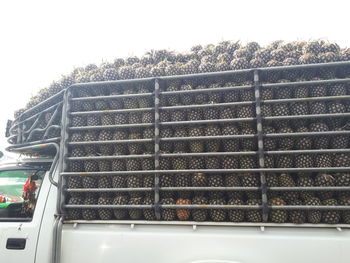 Close-up of metallic structure against sky