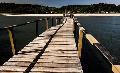 Wooden pier over river