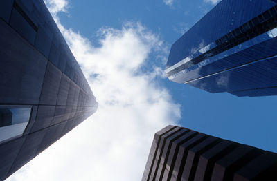 Low angle view of office building against sky