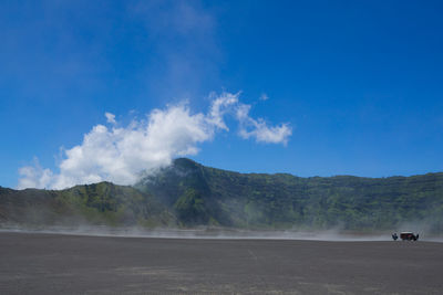 Scenic view of land against sky