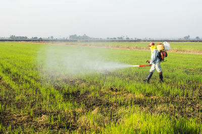 Full length of man working at farm