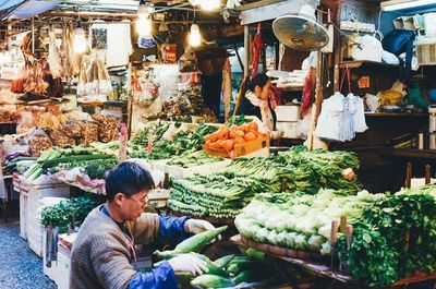 Friends for sale at market stall