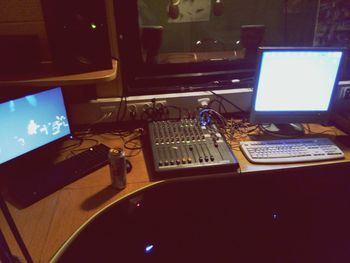 Illuminated laptop on table