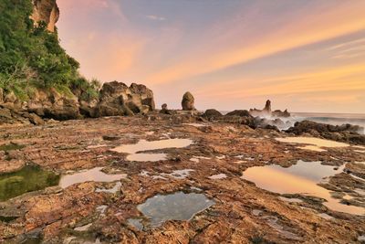 Scenic view of sea against sky during sunset