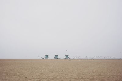 View of shore against clear sky