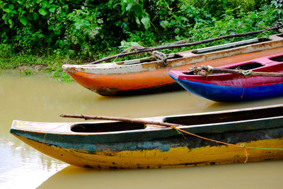 Boat moored in lake