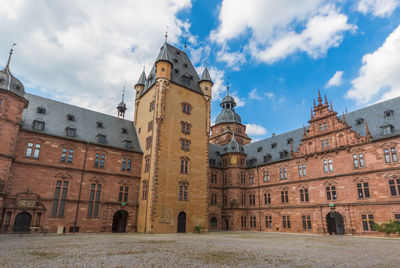 Low angle view of buildings against sky