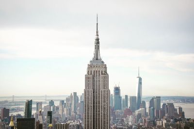 Skyscrapers in city against sky