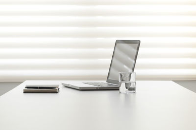 Close-up of laptop on table