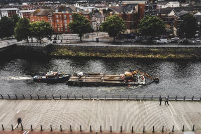 High angle view of people on boat in river