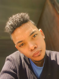 Close-up portrait of a serious young man