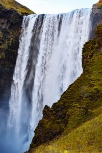 Scenic view of waterfall skogafoss in iceland 