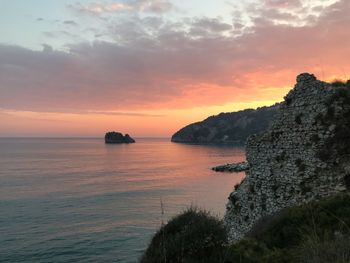 Scenic view of sea against sky during sunset