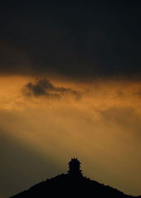 Low angle view of silhouette tree against sky during sunset