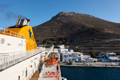 Panoramic view of sea and mountains against sky