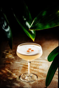 Pisco sour - peruvian and chilean cocktail classic in tropical setting