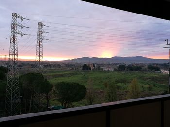 Scenic view of landscape against sky during sunset