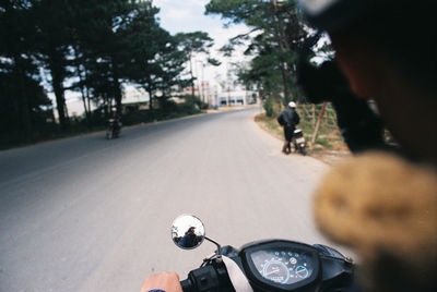 Person riding bicycle on road