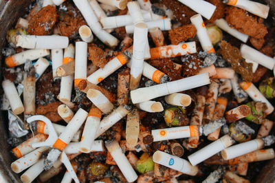 Directly above shot of cigarette butts in ashtray