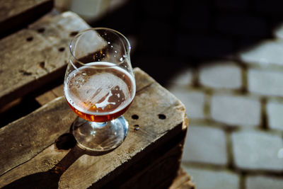 Close-up of beer glass on table