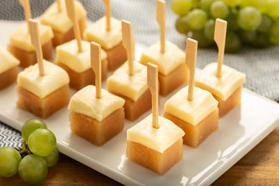 High angle view of chopped slices in plate on table