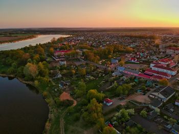 High angle view of townscape against sky during sunset