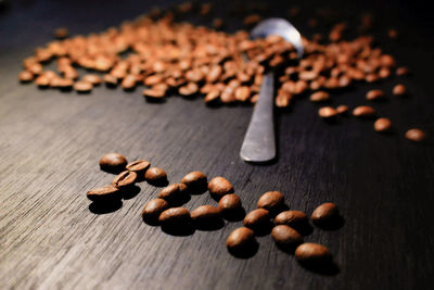 Close-up of coffee beans on table