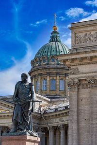 Low angle view of statue of cathedral against sky