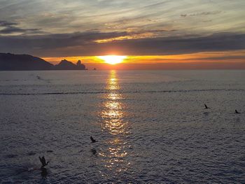 Scenic view of sea against sky during sunset