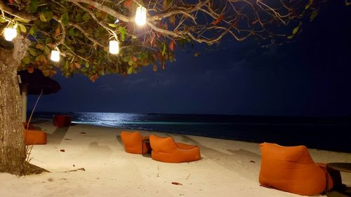 Scenic view of sea against sky at night