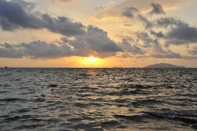 Scenic view of sea against sky at sunset