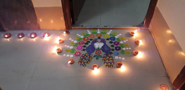 High angle view of illuminated lights on ceiling