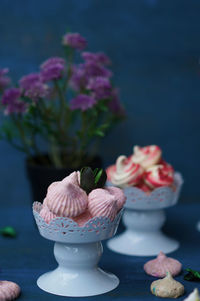 Close-up of pink roses on table