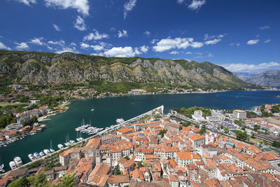 High angle view of river and buildings in town