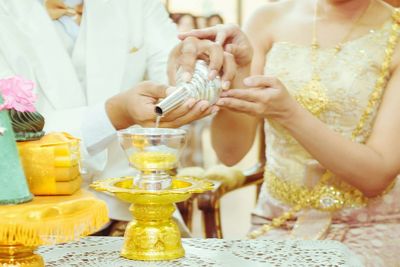 Close-up of hand holding glass