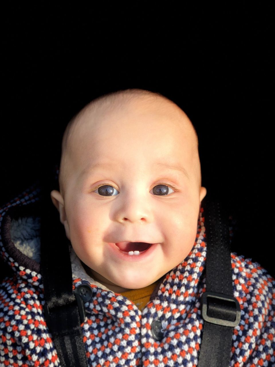 portrait, innocence, baby, child, cute, one person, looking at camera, childhood, young, babyhood, toddler, front view, real people, indoors, clothing, black background, headshot, human face, warm clothing, mouth open