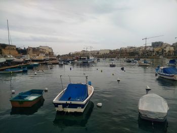 Boats moored in harbor