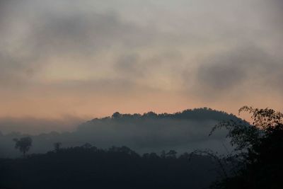 Scenic view of landscape against sky during sunset