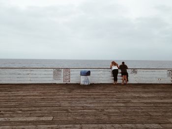 Silhouette of man standing on beach