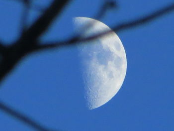 Low angle view of moon against sky