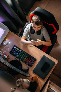 High angle view of man working on table