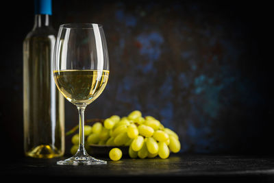 Close-up of wineglass on table