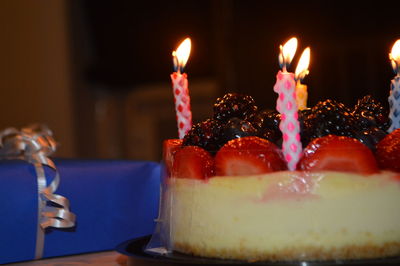 Close-up of tea light candles on table