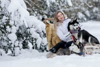 View of dog on snow covered field