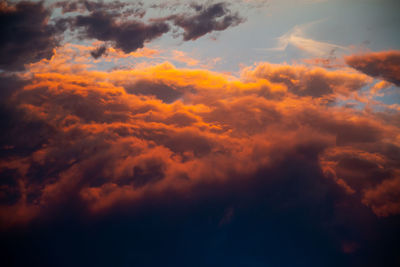 Low angle view of dramatic sky during sunset